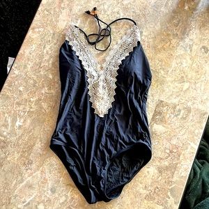 Anthropologie black one piece swim suit with white/cream color lace